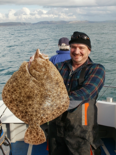 [Ricky with his 12lb turbot]